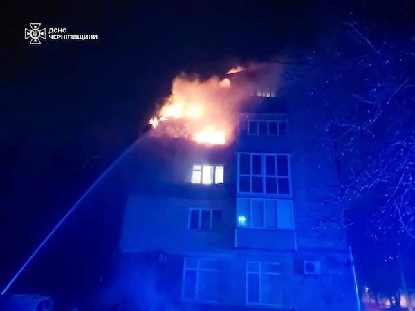 In this photo provided by the Ukrainian Emergency Service, firefighters put out a fire at a apartment building following a Russian drone attack in Chernihiv, Ukraine, Sunday, March 16, 2025. (Ukrainian Emergency Service via AP)