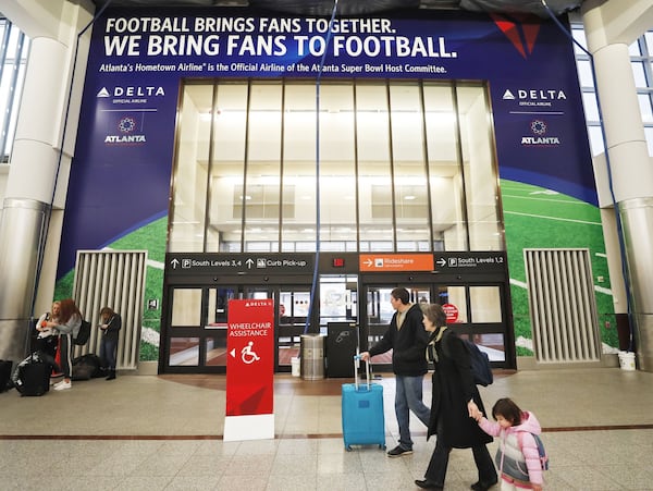 1/18/19 - Atlanta - This entrance is on the South Terminal side. The Super Bowl will provide a challenge for the world’s busiest airport. Officials say the game will mean a 30 percent spike in traffic at Hartsfield Jackson-International Airport, up from the 2,500 flights a day it usually handles. Bob Andres / bandres@ajc.com