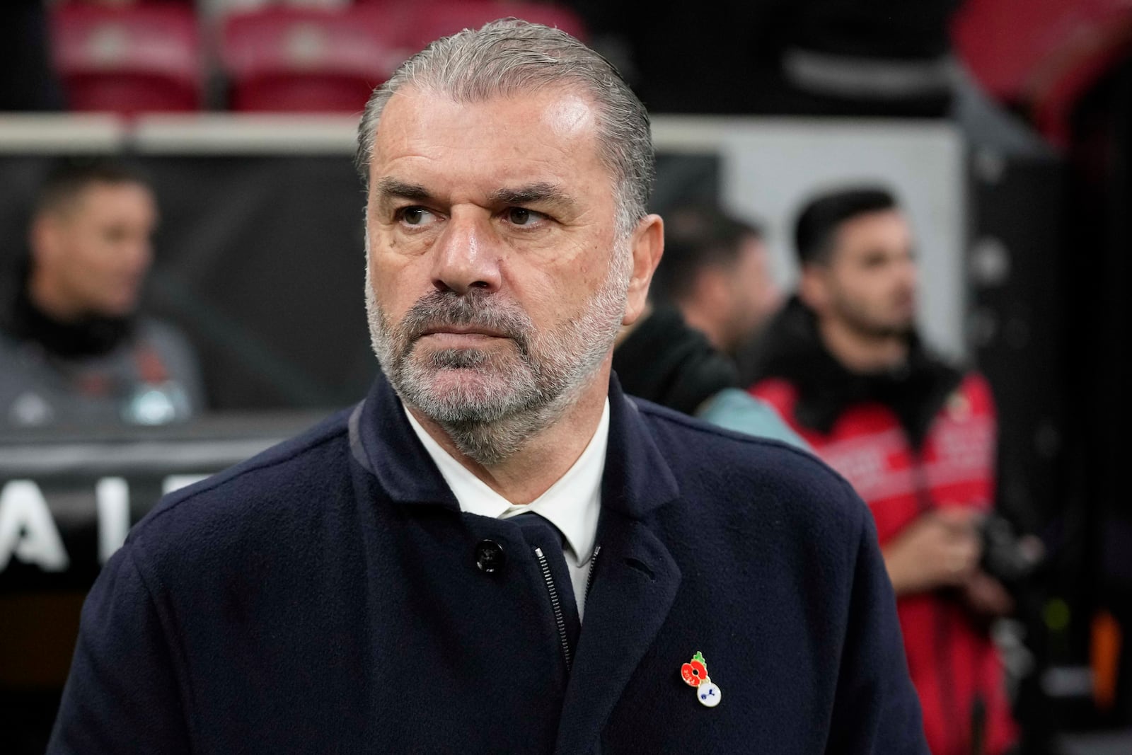 Tottenham's head coach Ange Postecoglou watches during the Europa League opening phase soccer match between Galatasaray and Tottenham Hotspur at Ali Sami Yen stadium, in Istanbul, Turkey, Thursday, Nov. 7, 2024. (AP Photo/Khalil Hamra)