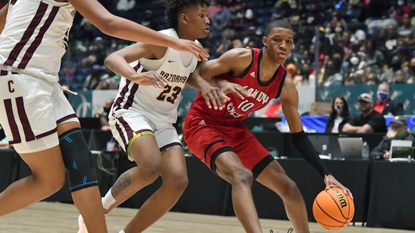 Sandy Creek's Jabari Smith (10) dribbles against Cross Creek's Antoine Lorick (23) during the Class 3A boys championship game Friday, March 12, 2021, in Macon. Cross Creek won 57-49. (Hyosub Shin / Hyosub.Shin@ajc.com)