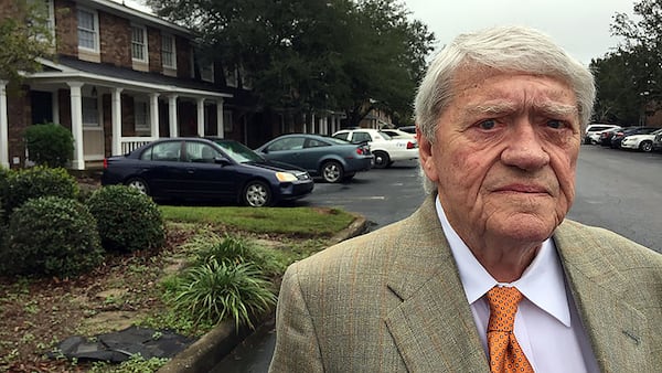 James Holloway, a real estate investor in Albany, Ga., blames attorney Ken Hodges for running his rental property business into the ground. Holloway is seen here at the entrance to The Gardens on Whispering Pines. JOHNNY EDWARDS / JREDWARDS@AJC.COM