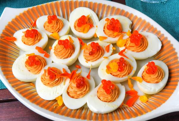 Smoked Trout Deviled Eggs would be at home at brunch or a catered event. They're based on a recipe from chef Jessica Rothacker, co-owner of Heirloom Cafe and Fresh Market in Athens. STYLING BY JESSICA AND JORDAN A. ROTHACKER / CONTRIBUTED BY CHRIS HUNT PHOTOGRAPHY