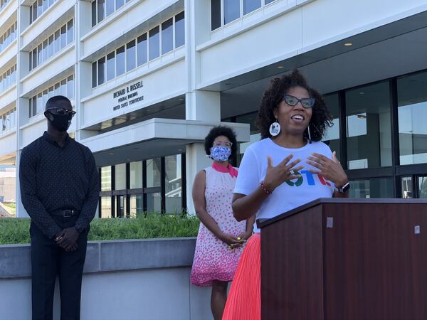 Wanda Mosley of Black Voters Matter speaks in 2020 outside the Richard Russell B. Federal Building in Atlanta about a lawsuit seeking changes to elections to the Georgia Public Service Commission. Mosley is surrounded by other plaintiffs in the lawsuit, Georgia NAACP President James Woodall and Briont McCorkle of Georgia Conservation Voters. MARK NIESSE / MARK.NIESSE@AJC.COM