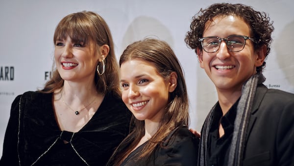 Atlanta Film Festival marketing manager Laura Williamson (from left), "Anora" actress Luna Sofia Miranda and film producer Camilo Diaz attend an event at the Tara Theatre in Atlanta on Saturday, March 15, 2025. (Courtesy of Joel Valdes)