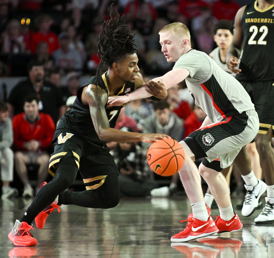 Georgia guard Blue Cain (0) puts pressure on Vanderbilt guard Jason Edwards (1) in the first half of an NCAA Basketball game Saturday, March 8, 2025 at Stegeman Coliseum in Athens. (Daniel Varnado/For the Atlanta Journal-Constitution)