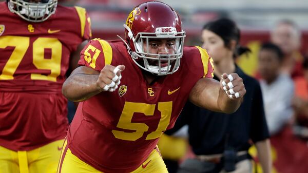 Southern California defensive lineman Marlon Tuipulotu (51) warms up before game against Arizona Saturday, Oct. 19, 2019, in Los Angeles. (Marcio Jose Sanchez/AP)