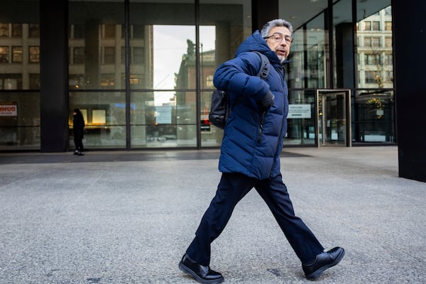 Former Chicago Alderman Daniel Solis leaves Dirksen U.S. Courthouse after another day of testimony in the corruption trial of former Speaker Michael Madigan in Chicago on Dec. 3, 2024. (Tess Crowley/Chicago Tribune via AP)