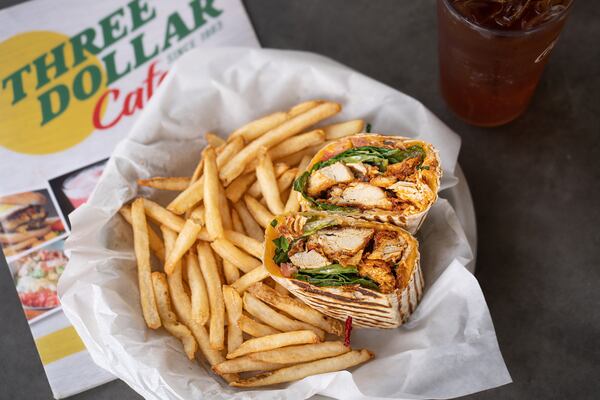 At Three Dollar Cafe, you can get a wrap with crispy or grilled chicken tossed in hot sauce, with lettuce, diced tomatoes, cheddar cheese and ranch dressing. Courtesy of Three Dollar Cafe