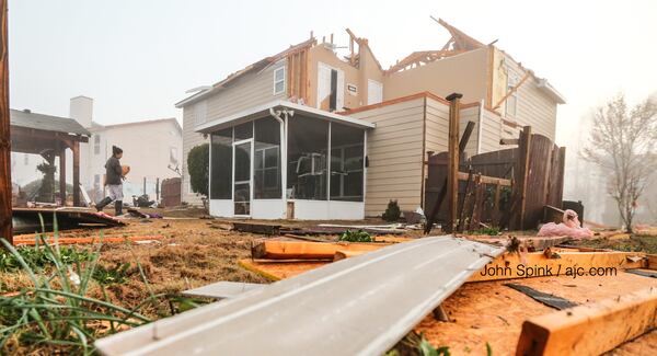 The top was blown off this South Fulton home. JOHN SPINK / AJC