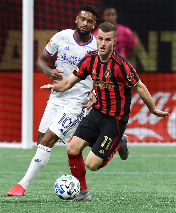 March 8, 2020 Atlanta: Atlanta United defender Brooks Lennon works against FC Cincinnati Juergen Locadia in a MLS soccer match on Saturday, March 8, 2020, in Atlanta.   Curtis Compton ccompton@ajc.com