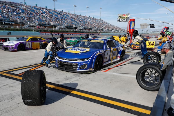 Chase Elliott makes a pit stop during the NASCAR Cup Series auto race at Homestead-Miami Speedway in Homestead, Fla., Sunday, Oct. 27, 2024. (AP Photo/Terry Renna)