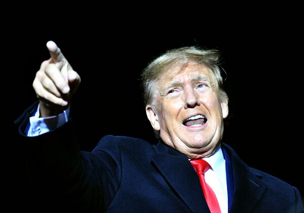 Former President Donald Trump speaks during a rally for Georgia GOP candidates at the Banks County Dragway in Commerce on Saturday, March 26, 2022. (Hyosub Shin / Hyosub.Shin@ajc.com)