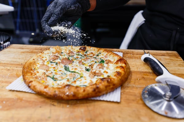 The Pizza Boxx offers a variety of pizzas, including smoked chicken (pictured), four cheese pizza and beef bulgogi. (Miguel Martinez / AJC)