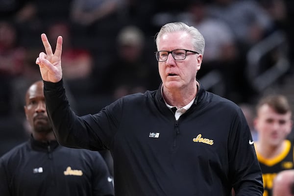 Iowa head coach Fran McCaffery watches against the Ohio State during the second half of an NCAA college basketball game in the first round of the Big Ten Conference tournament in Indianapolis, Wednesday, March 12, 2025. (AP Photo/Michael Conroy)