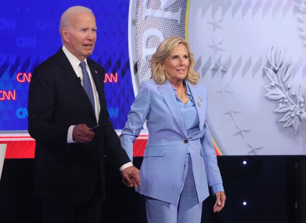 President Joe Biden and First Lady Jill Biden embrace after presidential debate with former President Donald Trump face off  at CNN, Thursday, June 27, 2024, in Atlanta. (Jason Getz / AJC)
