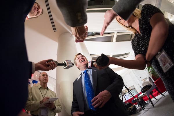 Atlanta mayoral candidate Peter Aman takes questions from the media during an election night party held at Hotel Indigo.