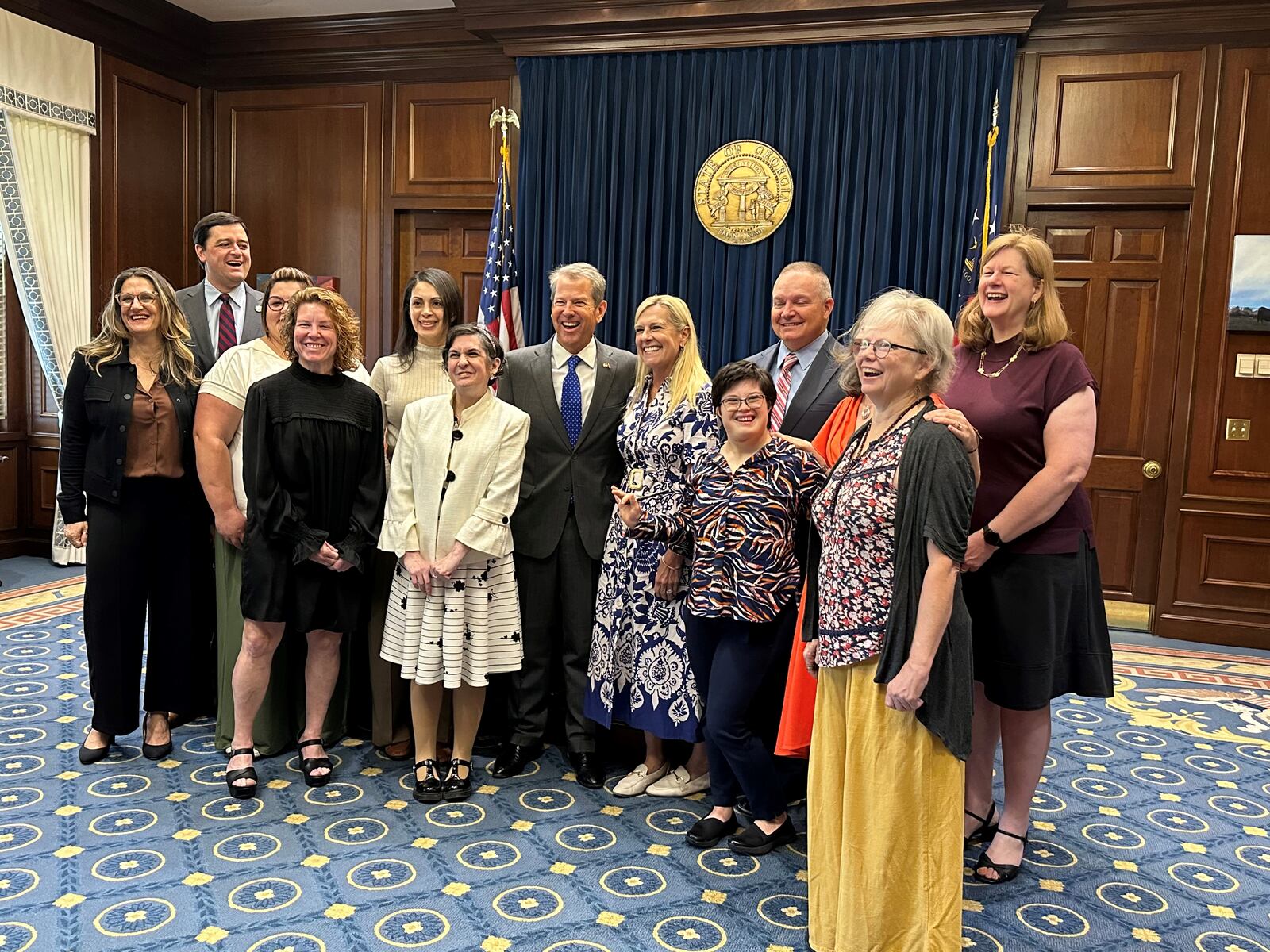 Martha Haythorn of Decatur and other members of the Georgia Council on Developmental Disabilities pose for a picture with Gov. Brian Kemp after their swearing-in ceremony. Haythorn, who has Down Syndrome, wants to spend her life advocating for the rights of the disabled. She is pictured on the front row, second from the right. Courtesy of Georgia Council on Developmental Disabilities