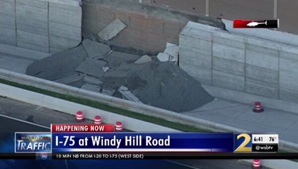 According to the WSB 24-hour Traffic Center, a wall collapsed along an unfinished portion of the Northwest Corridor Express Lanes project.