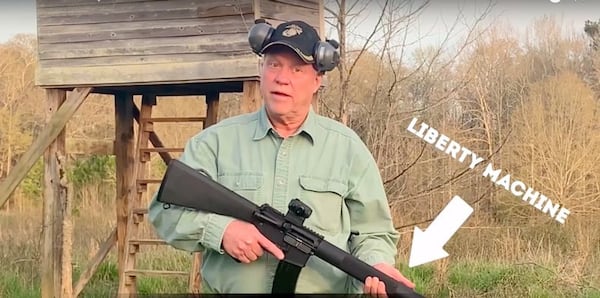 Former congressman Paul Broun and an AR-15, a tool to keep at bay the “looting hordes from Atlanta.” (From the Broun campaign video)