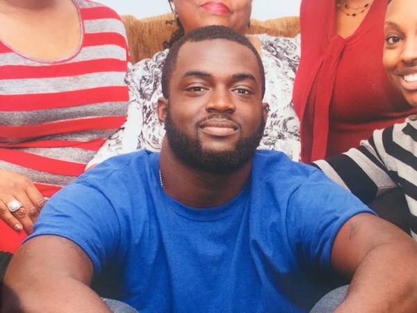 Andre Slocum, 25, was shot six times and killed while at work Tuesday morning. Slocum, a newlywed, had a son and was expecting a second child, his family said.