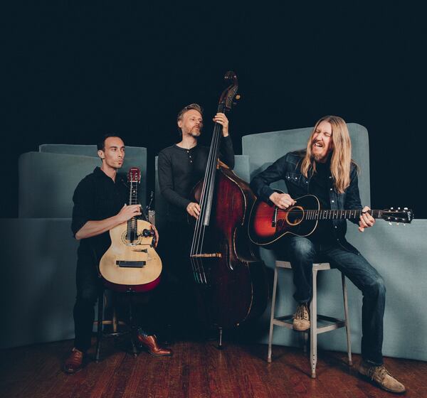 The Wood Brothers — Jano Rix (from left), Chris Wood and Oliver Wood — will at Atlanta's the Eastern on Dec. 5, 2024. Coutesy of Alysse Gafkjen