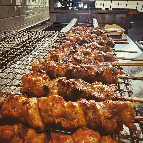 Chicken skewers cook on the yakitori grill at Yakitori Kona. Courtesy of Yakitori Kona