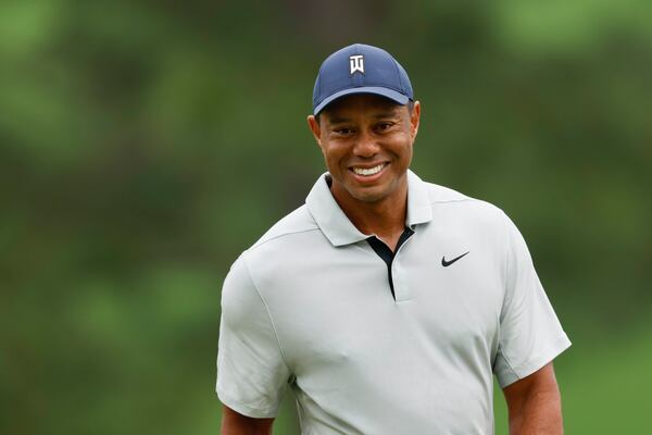 Tiger Woods reacts as he putts on the seventh hole during the practice round for the 2023 Masters Tournament at Augusta National Golf Club, Tuesday, April 4, 2023, in Augusta, Ga. Jason Getz / Jason.Getz@ajc.com)
