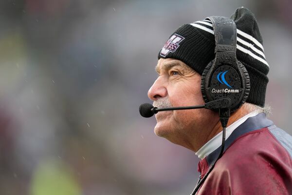 FILE - Massachusetts head coach Don Brown watches a replay against Texas A&M during the first quarter of an NCAA college football game, Nov. 19, 2022, in College Station, Texas. (AP Photo/Sam Craft, file)