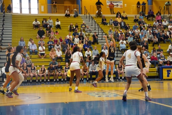 Marist's Kate Harpring puts up a shot against Creekside. Photo courtesy of Meredyth Gaynes