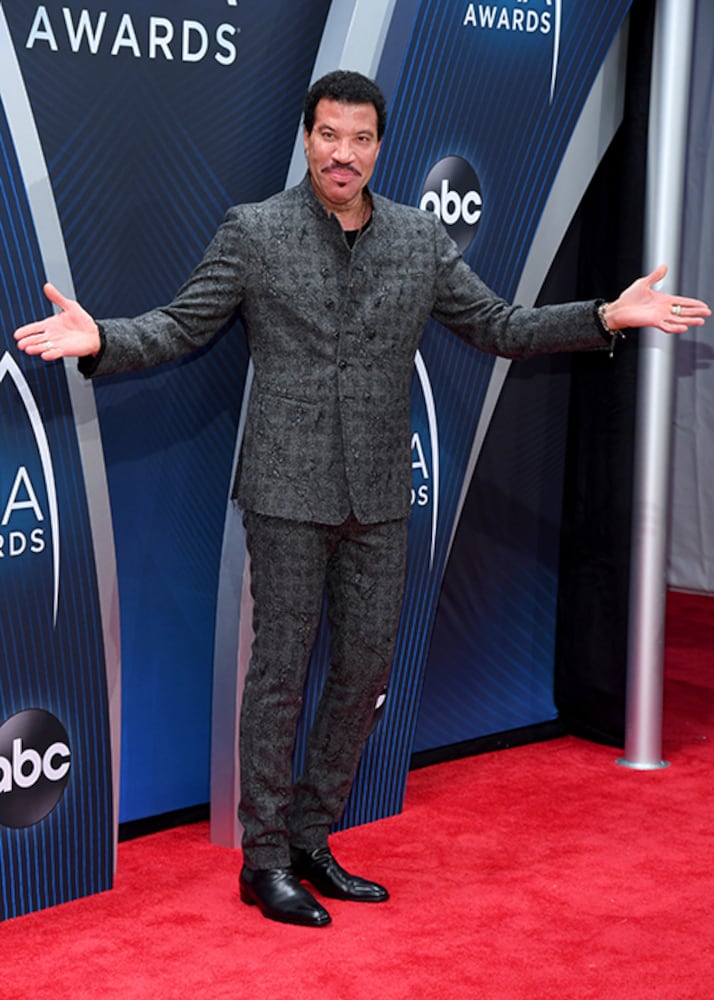 Photos: Stars shine on the CMA Awards red carpet