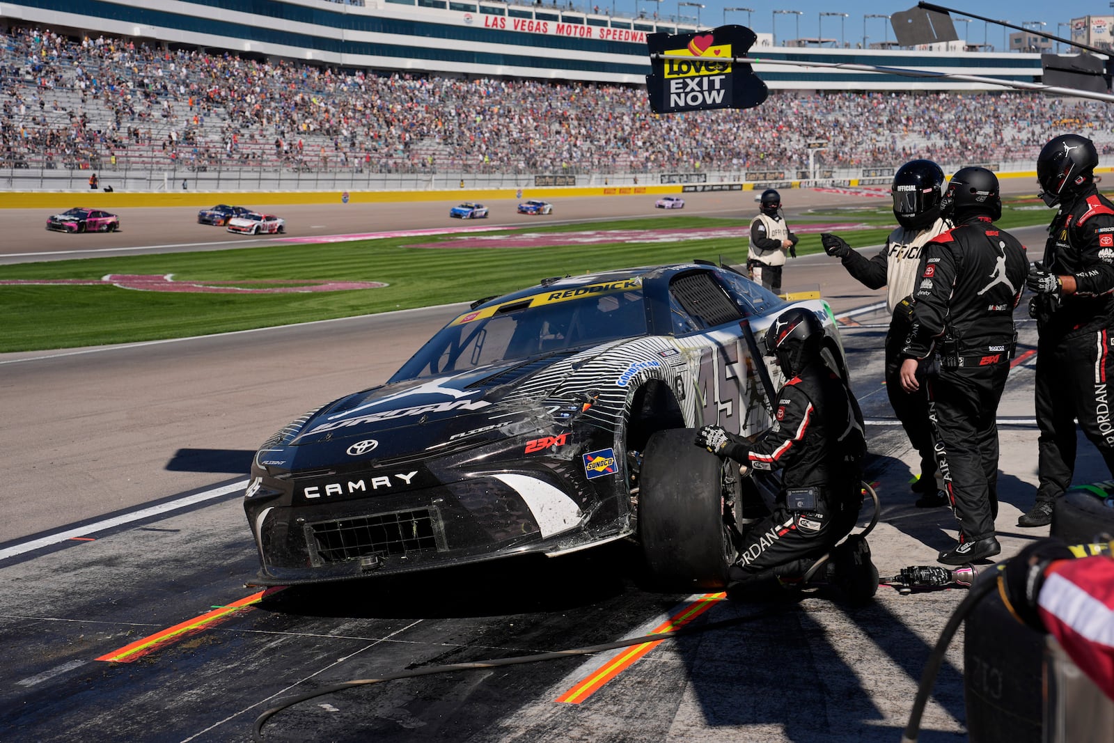 NASCAR Cup Series driver Tyler Reddick makes a pit stop after a crash during a NASCAR Cup Series auto race Sunday, Oct. 20, 2024, in Las Vegas. (AP Photo/John Locher)