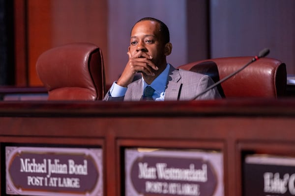 Council member Antonio Lewis listens to a report during a City Council public safety committee meeting at City Hall in Atlanta on Monday, February 24, 2025. The report by Atlanta Citizen Review Board executive director Lee Reid is in response to an AJC investigation about why the Atlanta Citizen Review Board did not investigate police shootings and in-custody deaths. (Arvin Temkar / AJC)