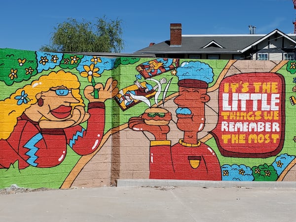 “Extra Polynesian Sauce,” is the title of George F. Baker III's lighthearted mural at the Chick-fil-A location at Boulevard and Ponce de Leon Avenue. Courtesy of Arthur Rudick