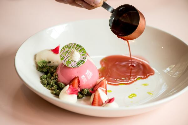  Creme De Fraises dessert with strawberry mousse, black pepper crumble, basil-lime sorbet, and strawberry consomme. Photo credit- Mia Yakel.