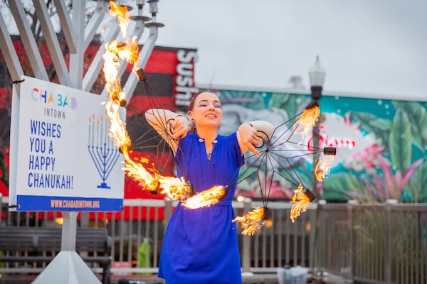 Chabad Intown orchestrates several menorah lightings as well as entertainment to celebrate Hanukkah. (Courtesy of Chabad Intown)