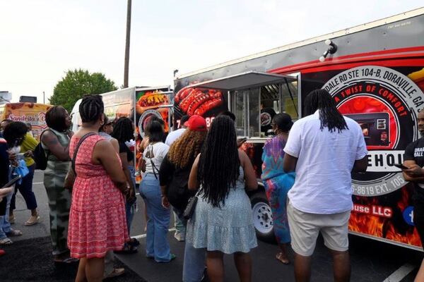 The crowd lines up at J's Smokehouse's grand opening.