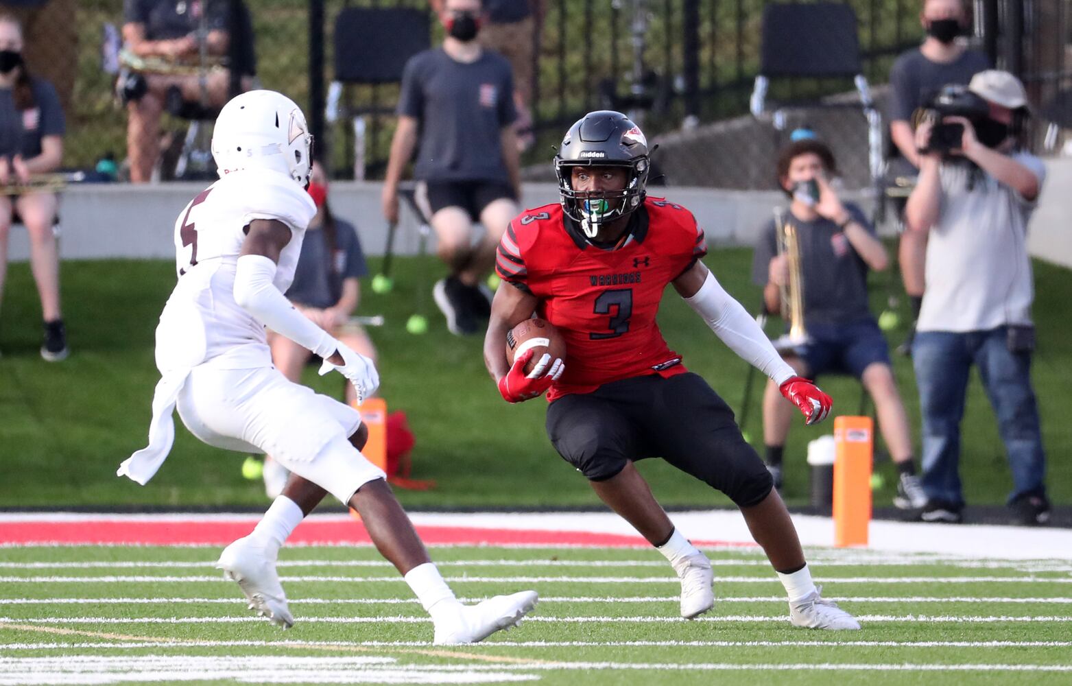 Cherokee running back Keith Adams Jr. (3) runs against Carver-Atlanta defender Demetrius Hinton (5) in the first half at Cherokee high school Wednesday, September 2, 2020 in Canton, Ga.. JASON GETZ FOR THE ATLANTA JOURNAL-CONSTITUTION