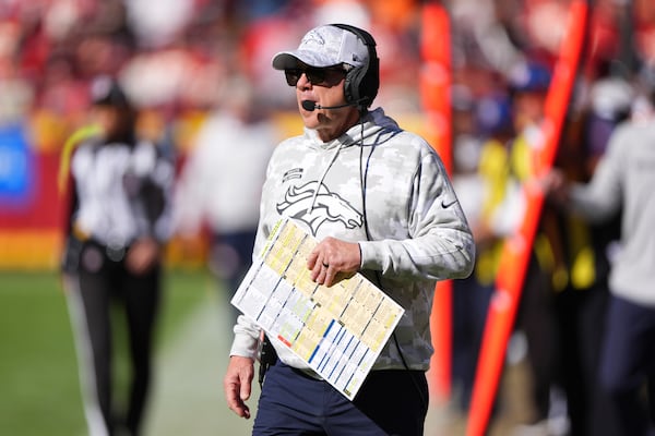 Denver Broncos head coach Sean Payton watches from the sidelines during the first half of an NFL football game against the Kansas City Chiefs Sunday, Nov. 10, 2024, in Kansas City, Mo. (AP Photo/Charlie Riedel)