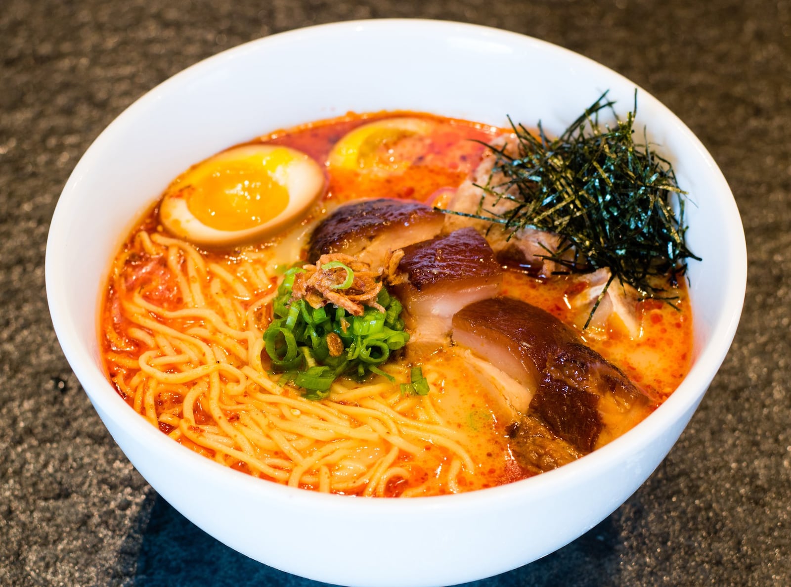 Looking for a satisfying solo lunch? Try the Szechuan bone marrow noodle soup at Food Terminal on Buford Highway. CONTRIBUTED BY HENRI HOLLIS