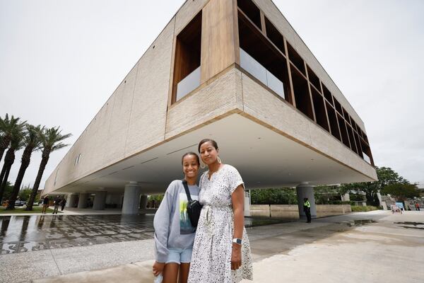 Nedra Rhone and her daughter Layla, 12, visit the new International African American Museum in Charleston, South Carolina during a tour of Black history museums of the South. Miguel Martinez/miguel.martinez@ajc.com