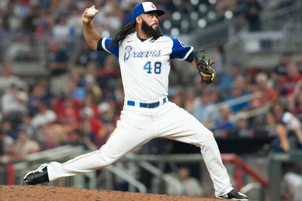 Atlanta Braves relief pitcher Richard Rodriguez throws in the during the eighth inning of a baseball game against the Milwaukee Brewers, Saturday, July 31, 2021, in Atlanta. (AP Photo/Hakim Wright Sr.)