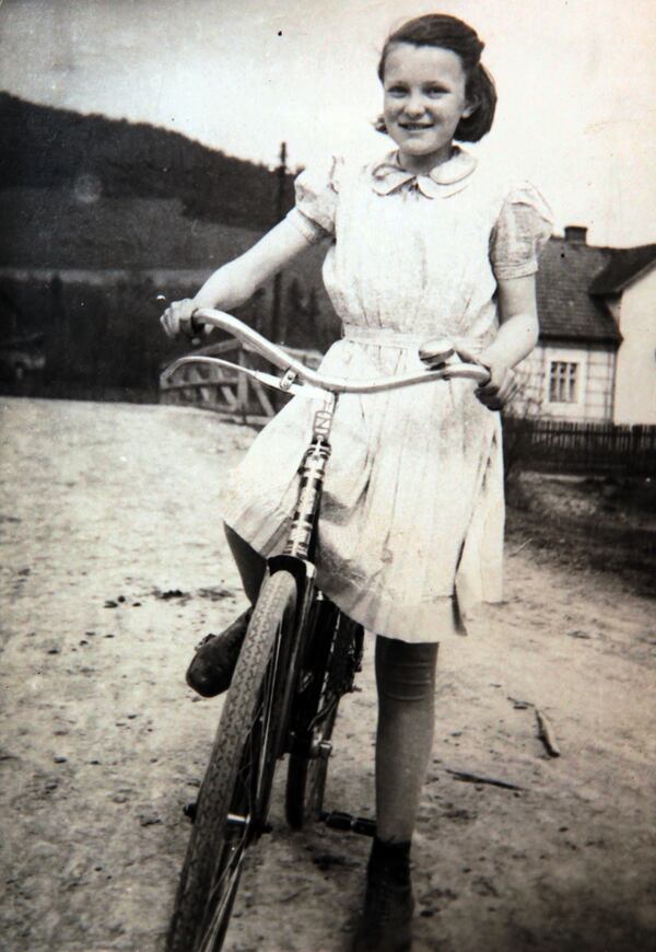 Copy photo of then-ten-year-old Ilse Reiner riding her bicycle. She moved to Atlanta in the 1970s.PHIL SKINNER / PSKINNER@AJC.COM 


