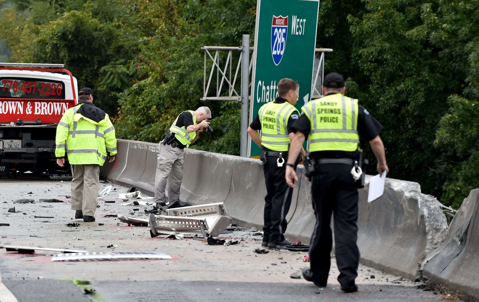 I-285 crash: Trucks plunge off interstate onto Ga. 400