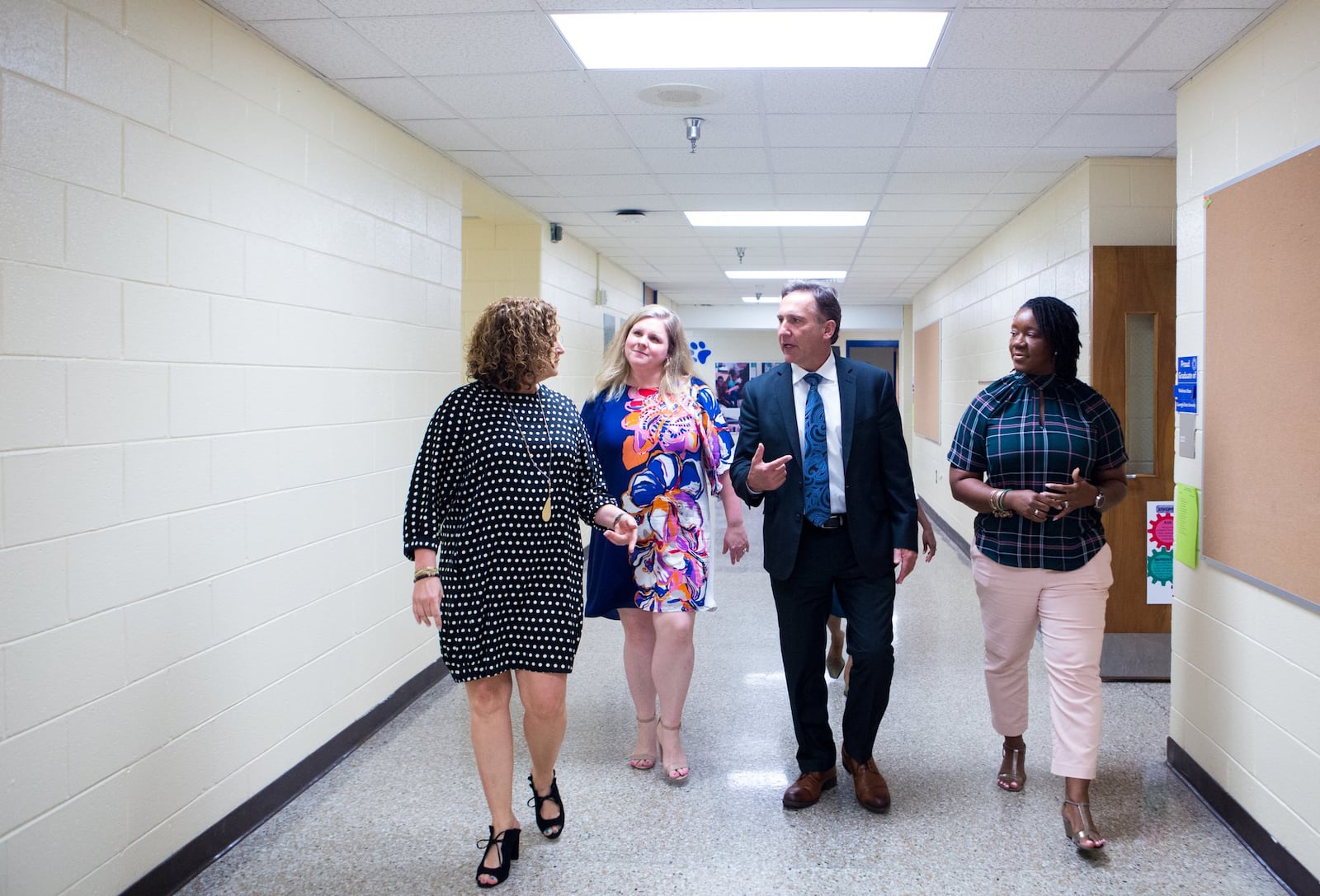 Fulton County Schools Superintendent Mike Looney (third from left) speaks with Jill Meeker, assistant principal of Evoline C. West Elementary School, Jennifer Burton, principal, and Leah McDaniel, principal of Campbell Elementary, as he tours Evoline C. West Elementary School during their summer school program in Fairburn on Thursday, June 13, 2019. Starting Monday, June 17, Looney will lead Georgia’s fourth largest school district, which has a general fund budget of more than $1 billion. CASEY SYKES FOR THE ATLANTA JOURNAL-CONSTITUTION