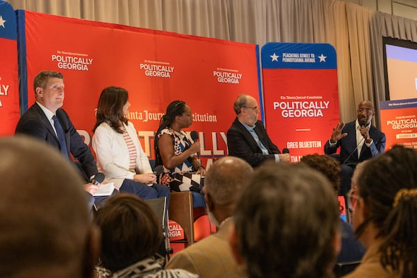 U.S. Sen. Raphael Warnock (right), D-Ga., spoke at an event in Savannah on Monday with the AJC Politically Georgia team (left to right): Greg Bluestein, Patricia Murphy, Tia Mitchell, and Bill Nigut.