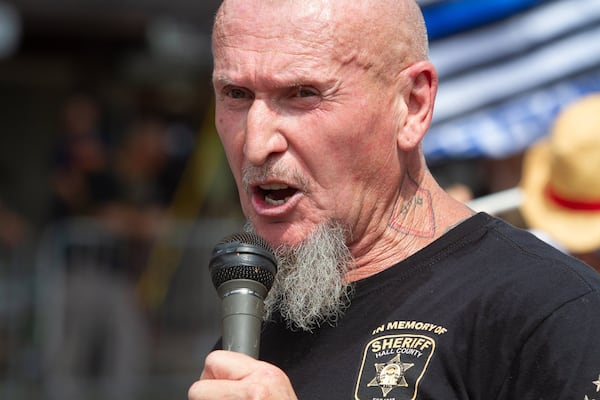 Chester Doles speaks to a small crowd at a pro-Trump rally in Dahlonega, Sept. 14, 2019. (Steve Schaefer for The Atlanta Journal-Constitution)