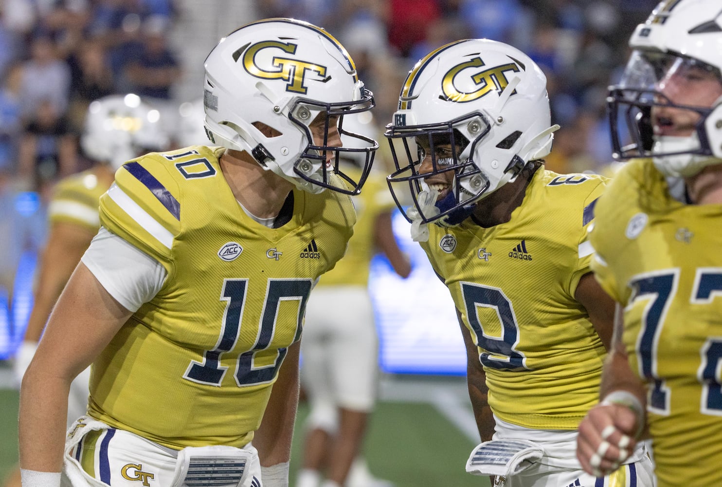 Georgia Tech Yellow Jackets wide receiver Malik Rutherford (8) celebrates his touchdown reception with quarterback Haynes King (10) during the second quarter against North Carolina Saturday.  Tech won 46-42. (Bob Andres for the Atlanta Journal Constitution)