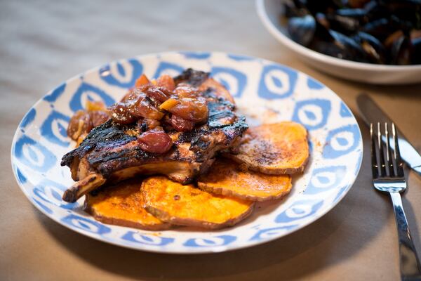 Sweet Tea Brined Pork Chop with curry sweet potatoes and grape chutney. Photo credit- Mia Yakel.