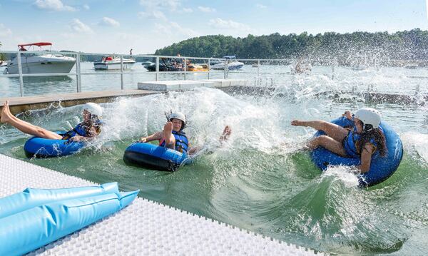 The new four-lane CAT4 Tube Slide at LanierWorld sends racers into Lake Lanier. (LanierWorld)