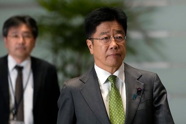 Finance Minister Katsunobu Kato arrives at the prime minister's office Monday, Nov. 11, 2024, in Tokyo. (AP Photo/Shuji Kajiyama)